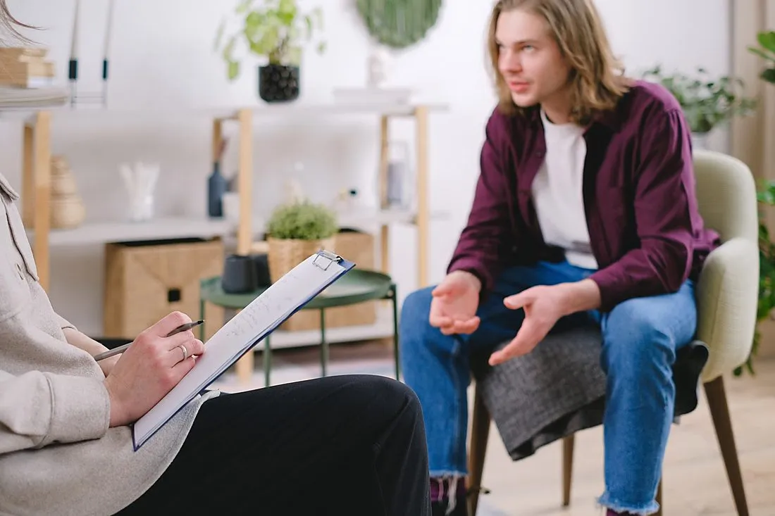 a child talking with an interviewer or counselor