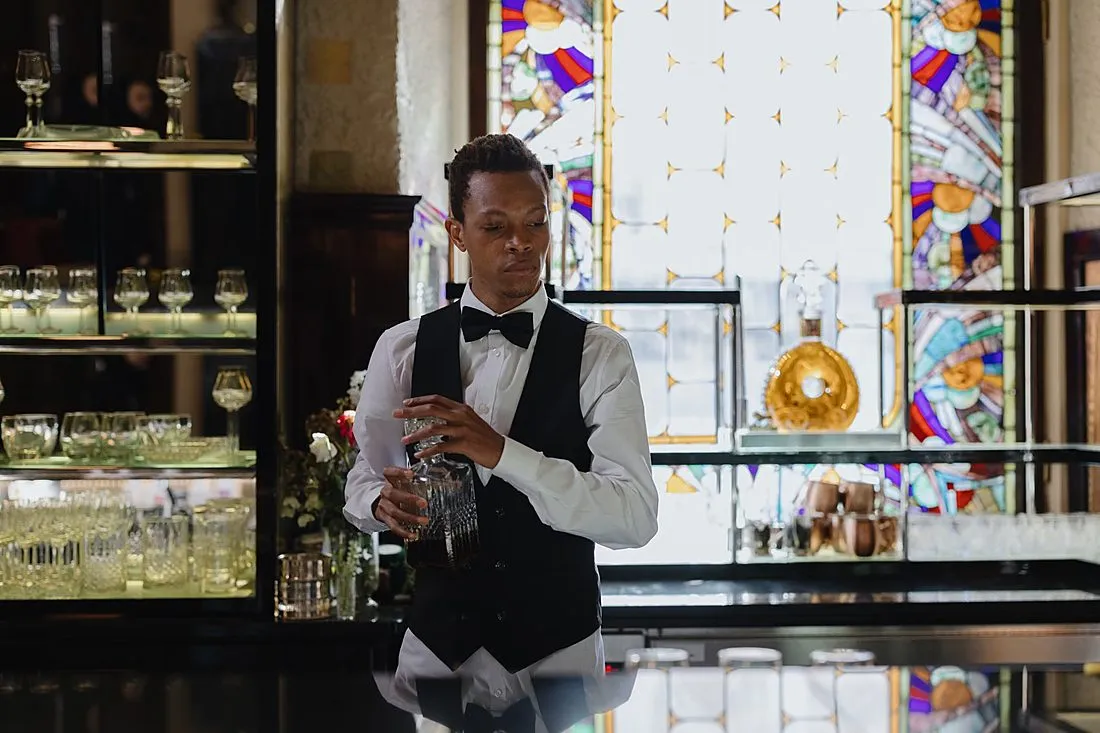 a bartender at a restaurant counter