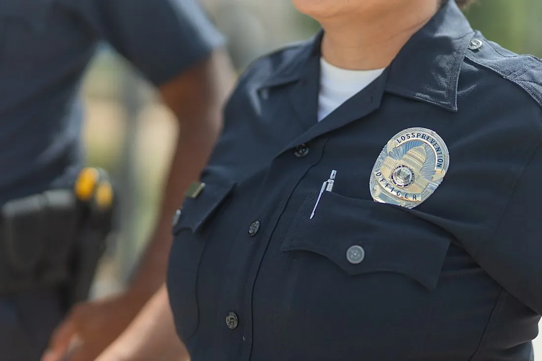 a police officer in uniform on a bridge