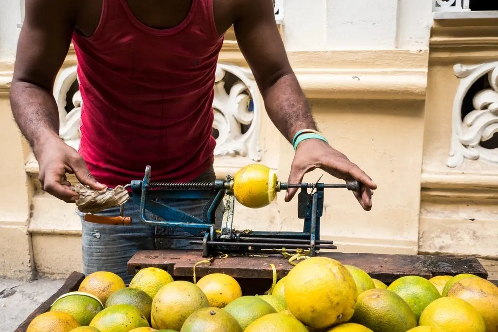 a street food vendor with a cart