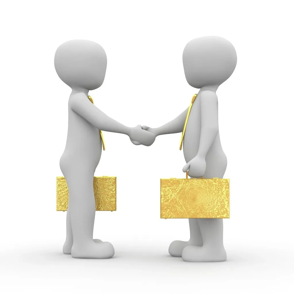 two young men shaking hands in a park