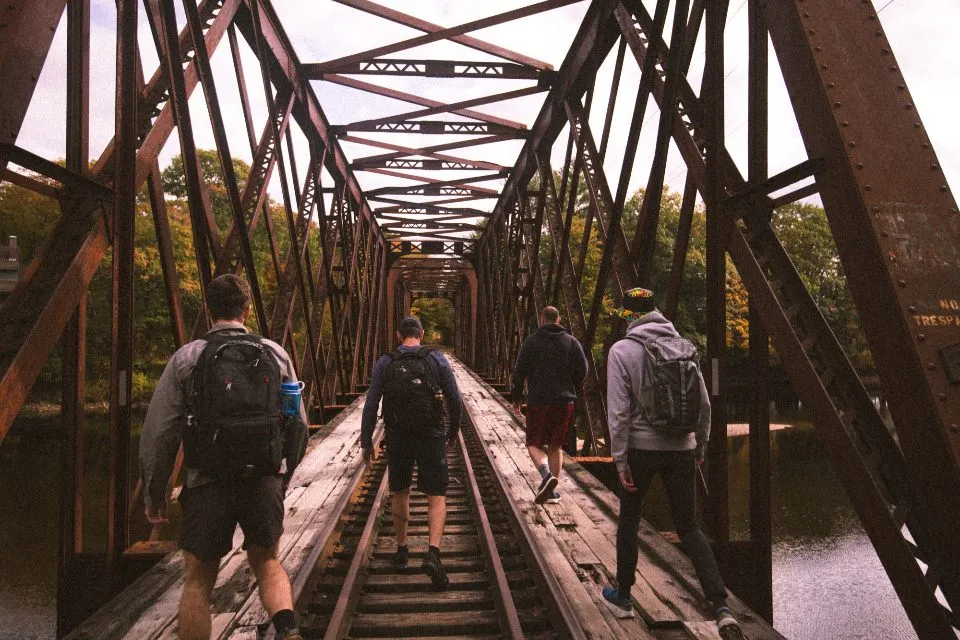 two friends walking together through a city